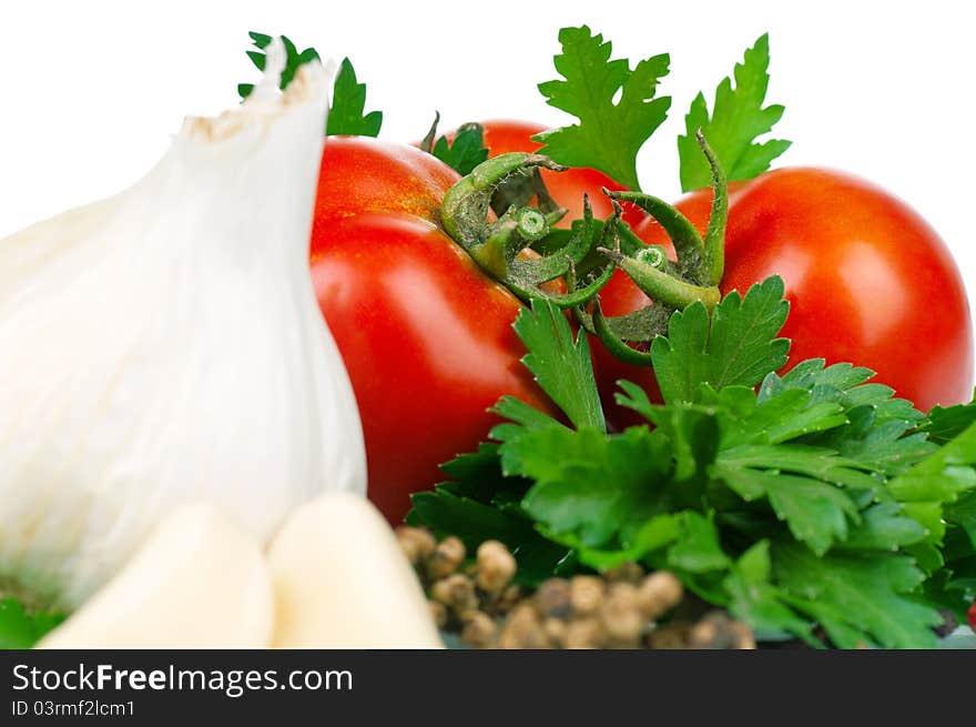 Fresh vegetables on white background - tomato, parsley, garlic, pepper