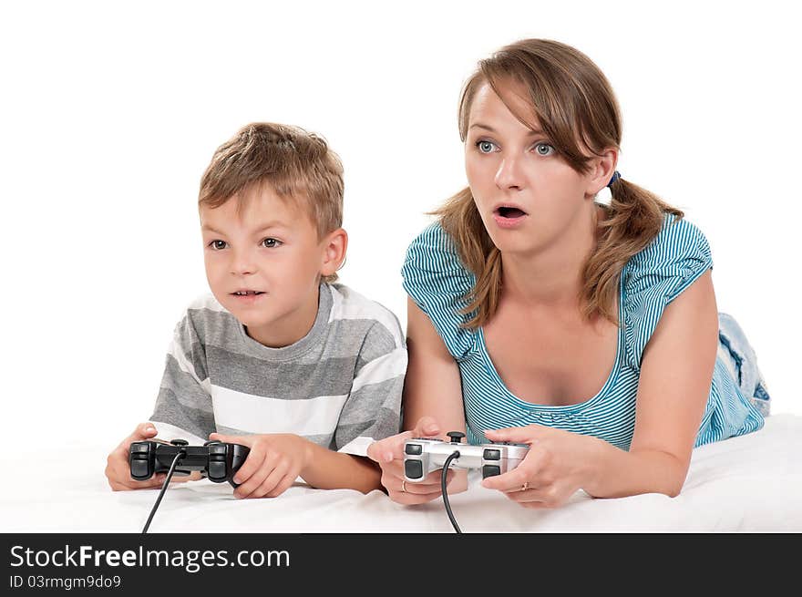 Happy family - mother and child playing a video game. Happy family - mother and child playing a video game