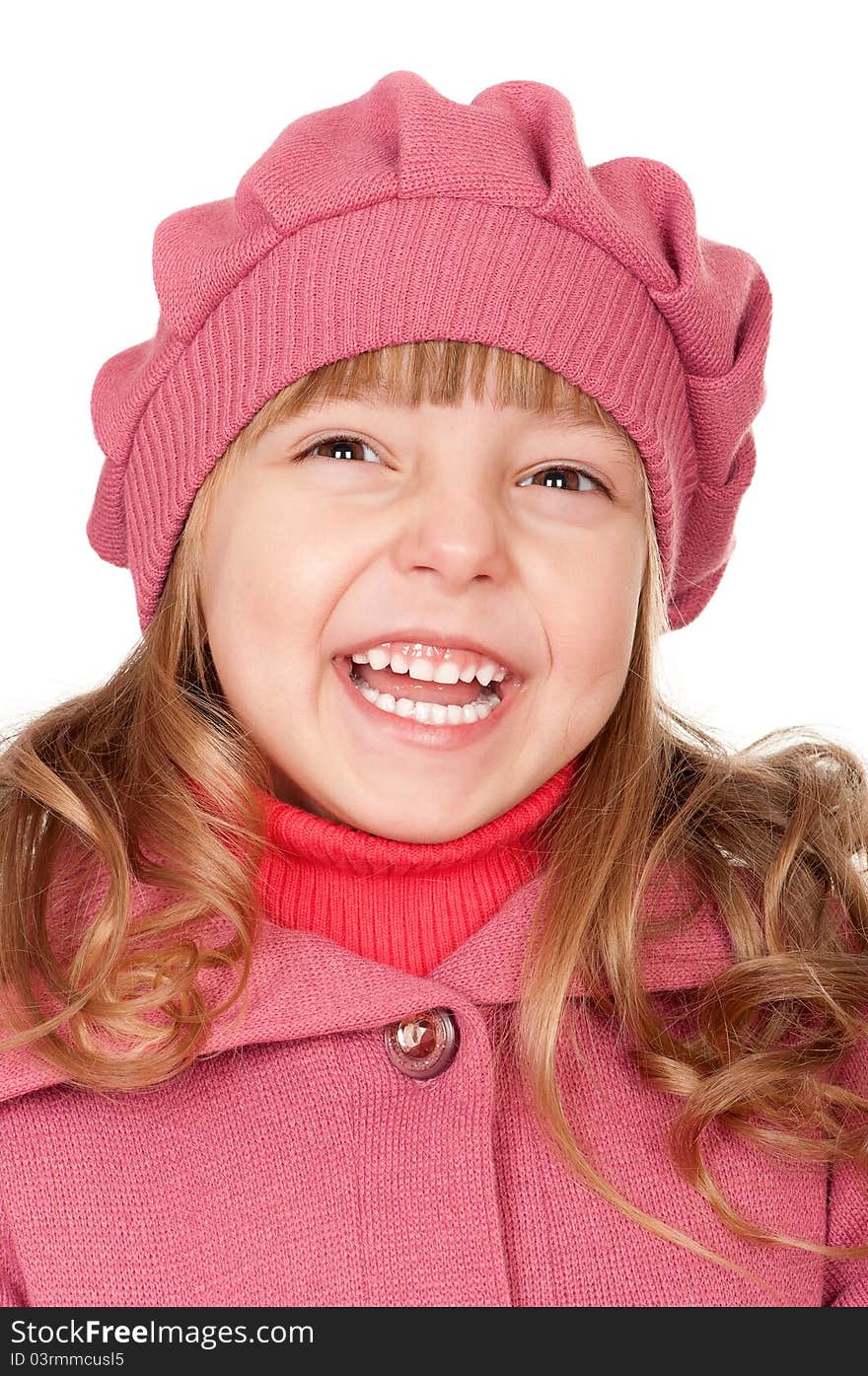 Portrait of a pretty little girl in sweater on white background