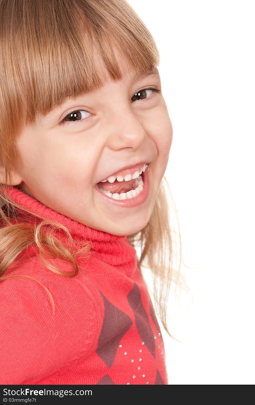 Portrait of a pretty little girl in sweater on white background