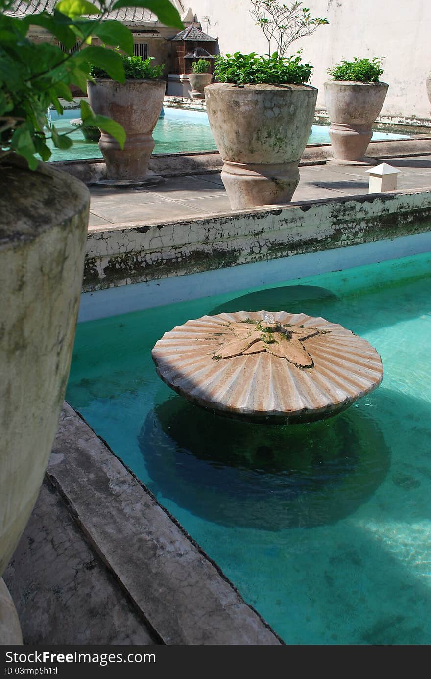 Blue pool water in the tamansari jogja