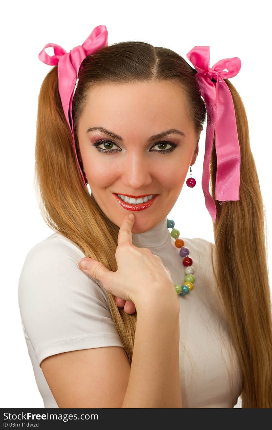 Portrait of beautiful girl with long hair and vibrant Make-up wearing pink satiny ribbon on white background. Portrait of beautiful girl with long hair and vibrant Make-up wearing pink satiny ribbon on white background