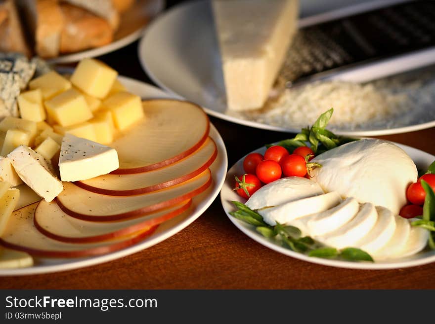 Various types of cheese and bread. Various types of cheese and bread