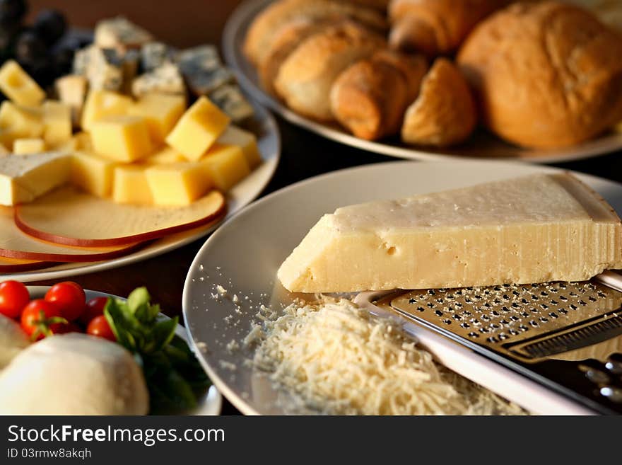 Various types of cheese and bread. Various types of cheese and bread