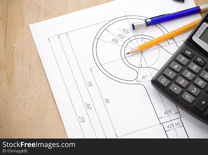 Pen and pencil, calculator on hook crane drafting