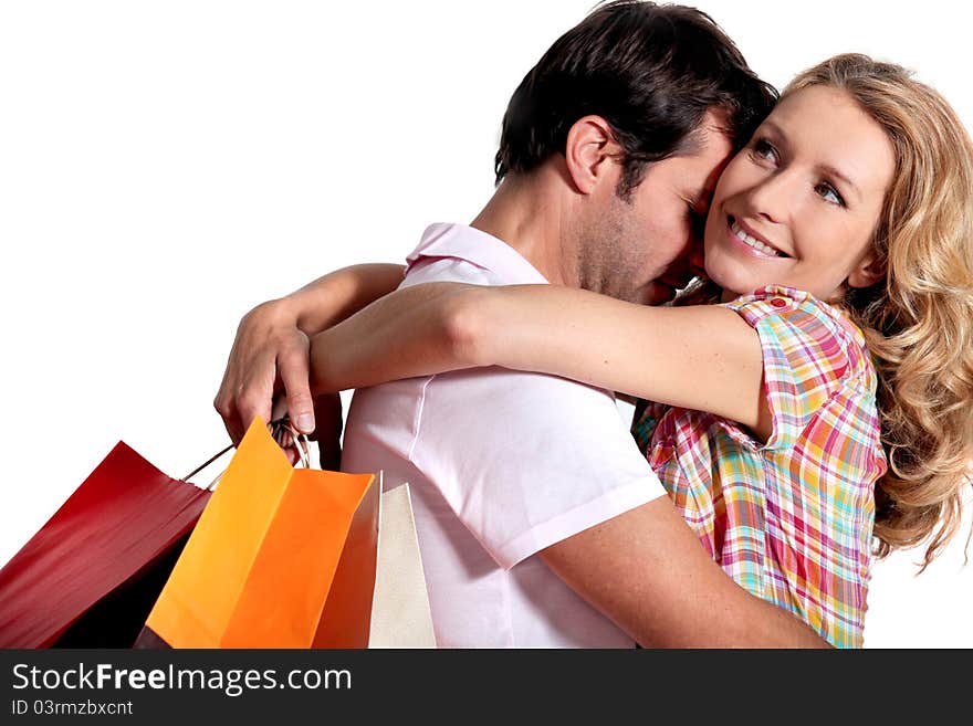 Portrait of a couple with shopping bags. Portrait of a couple with shopping bags