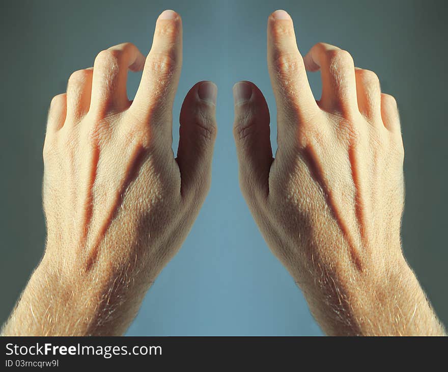 Hands on a blue background