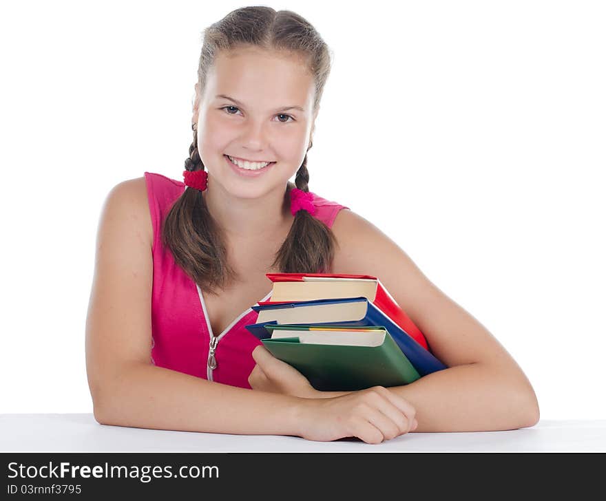 Portrait of the young girl with books