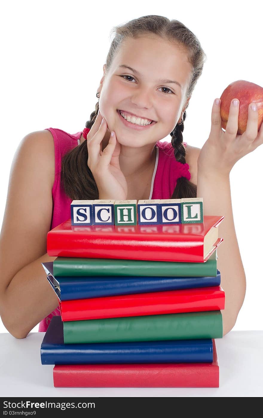 Portrait of the young girl with books