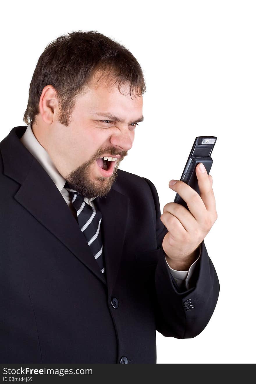 Businessman shouting into a mobile phone