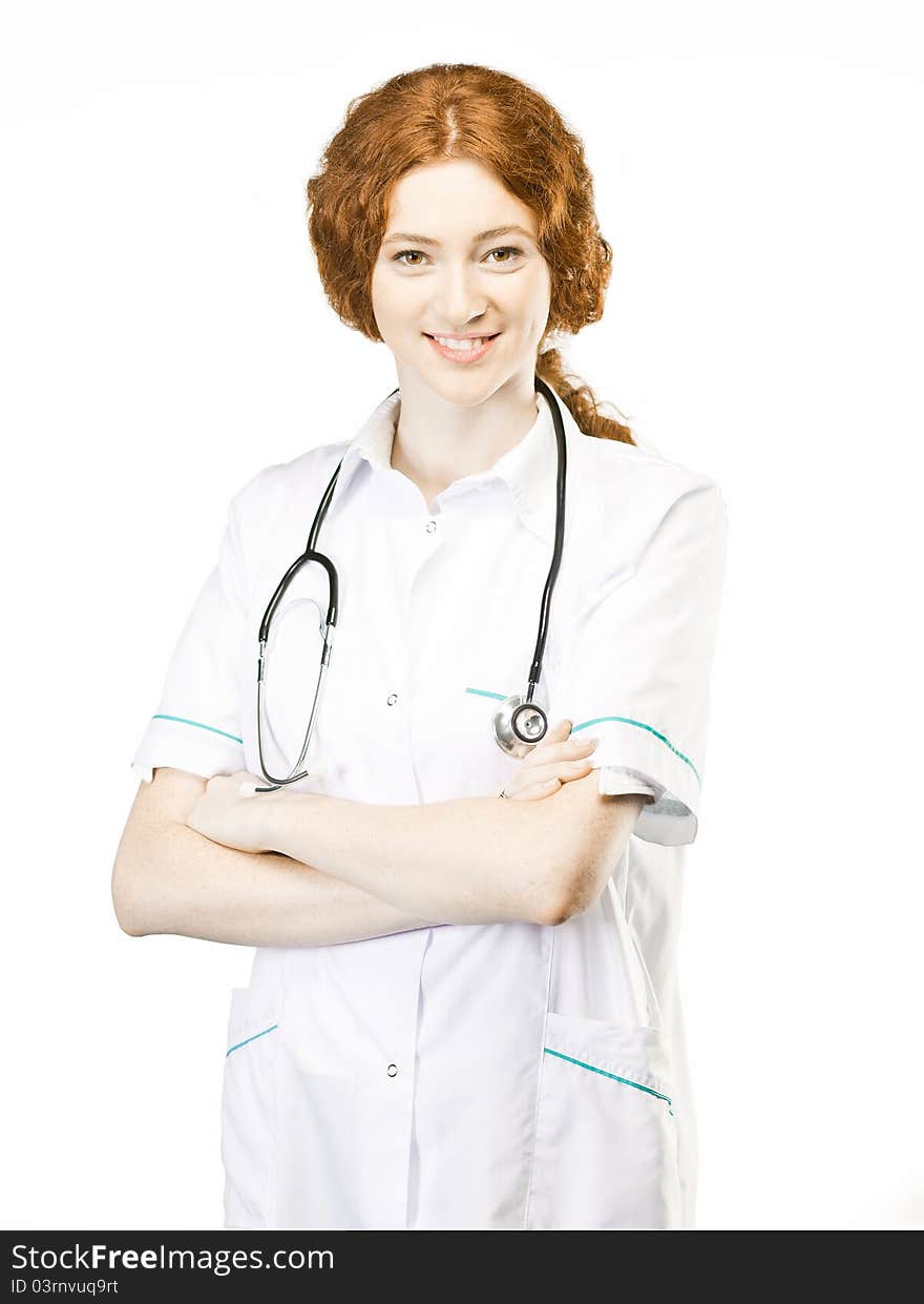 Young doctor isolated on white with a stethoscope. Young doctor isolated on white with a stethoscope