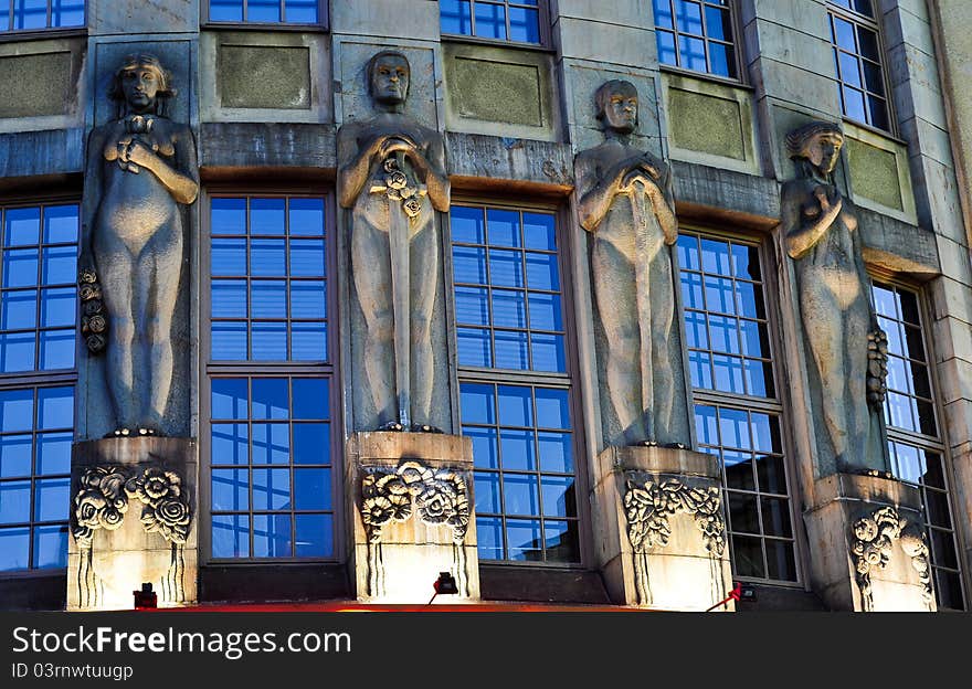 Four statues at the hotel Virgin Oil in the elegant art nouveau