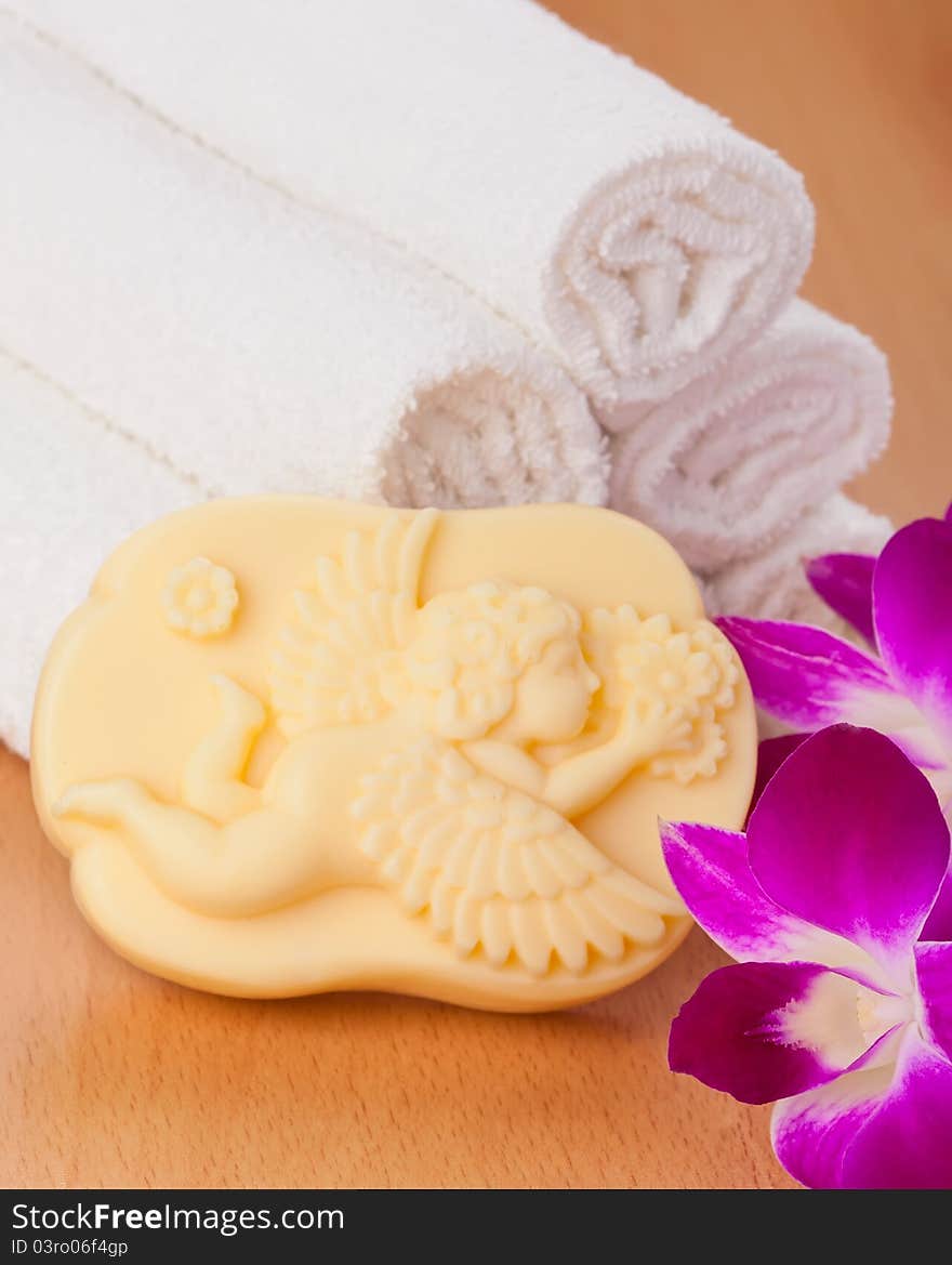 Handmade soap, towels and orchid