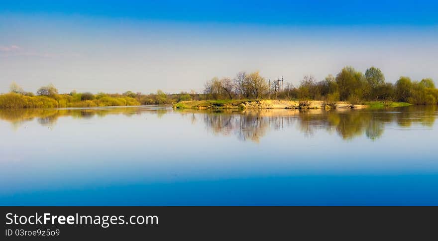 Sky reflection on lake.