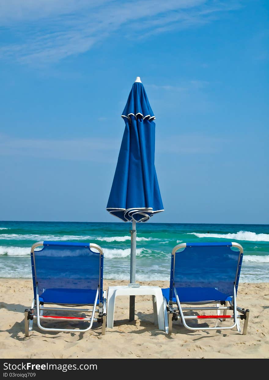 Sunbeds And Umbrella At Paradise Beach Thasos