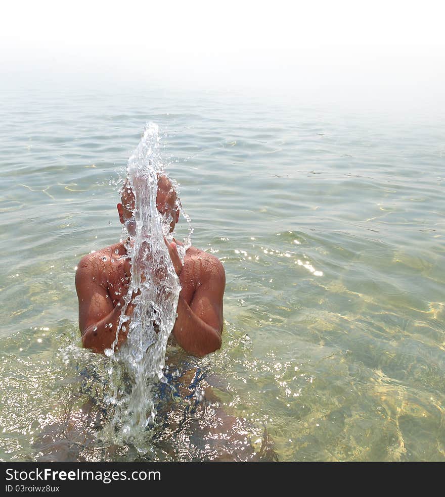 Fun In The Sea - Happy man in a sea