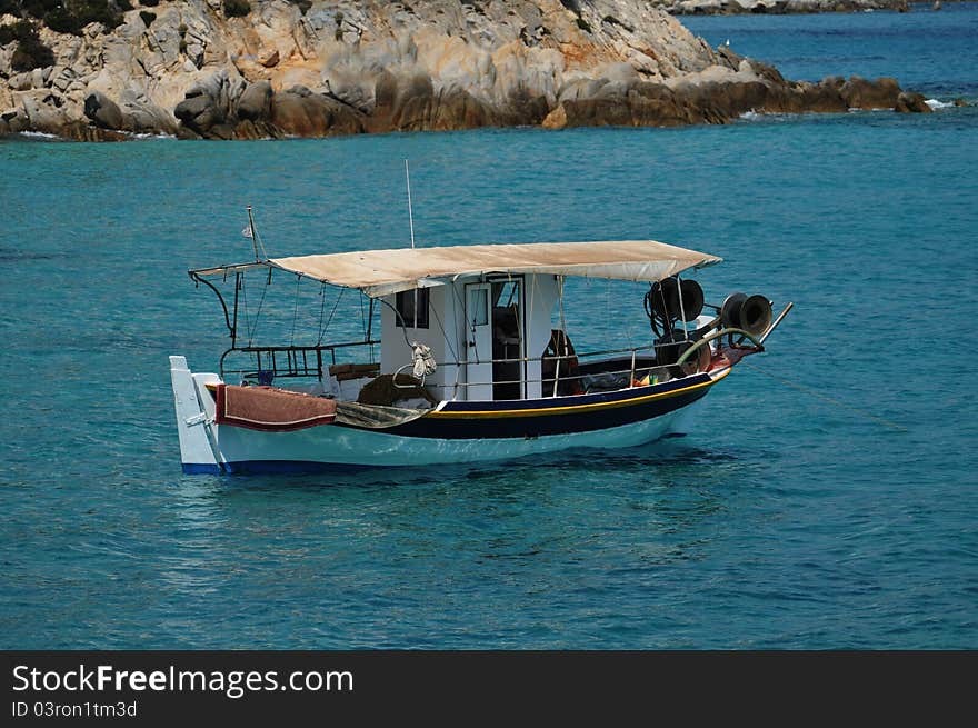 Fishing boat in the beautiful sea bay