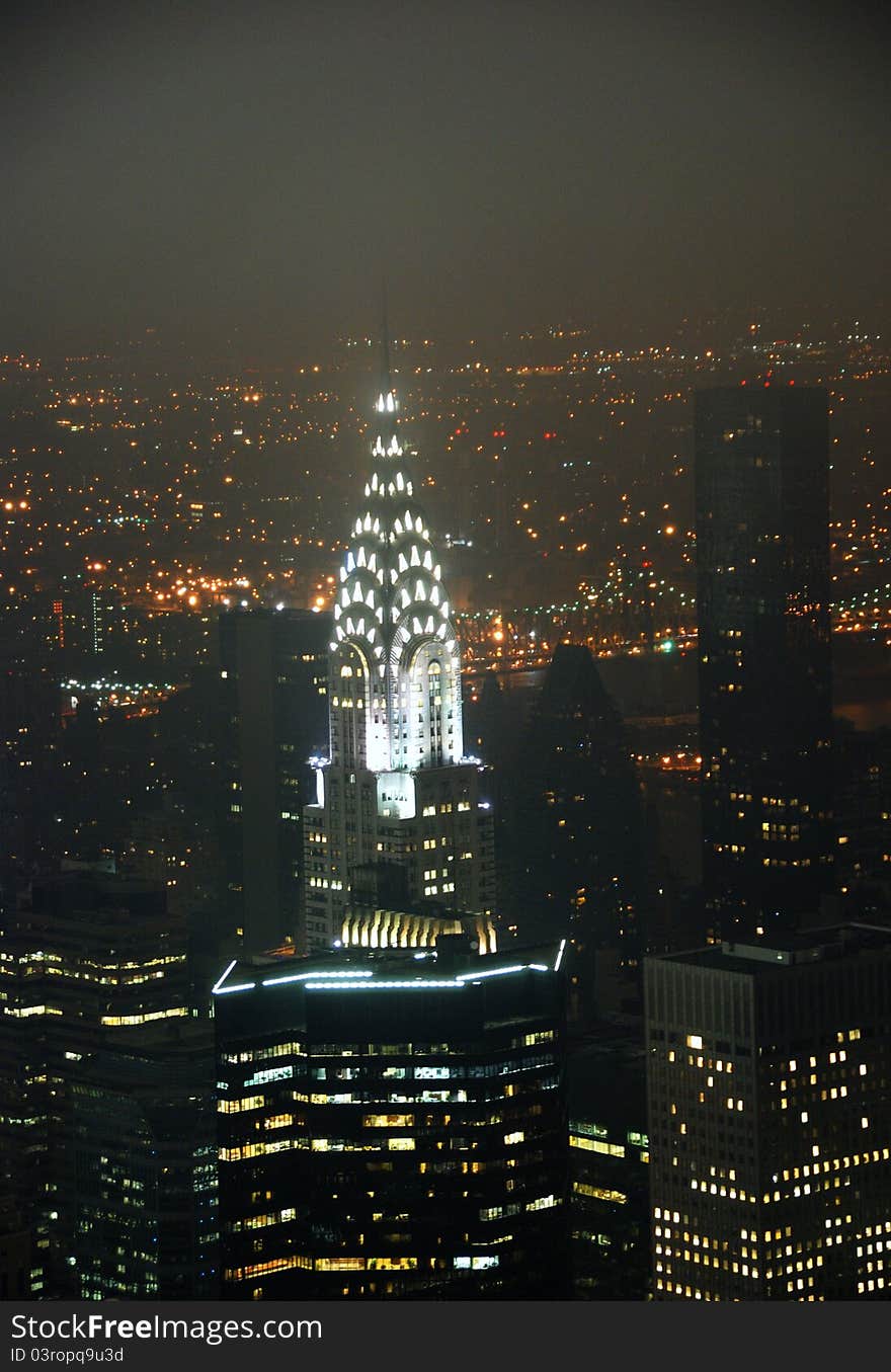 View looking over buildings in New York City at night. View looking over buildings in New York City at night