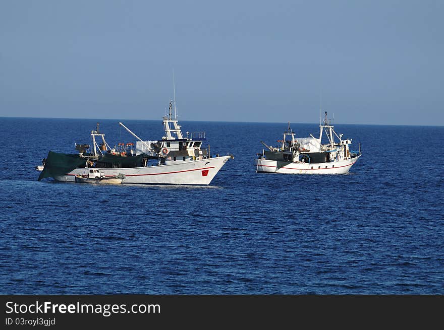 Fishing boats at sea