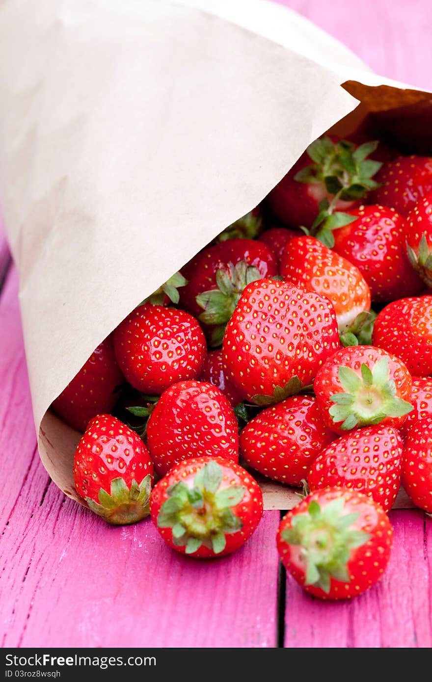 Strawberry in a paper bag