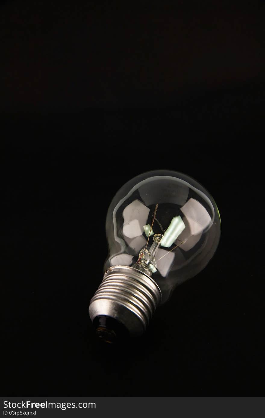 Light bulb isolated on black