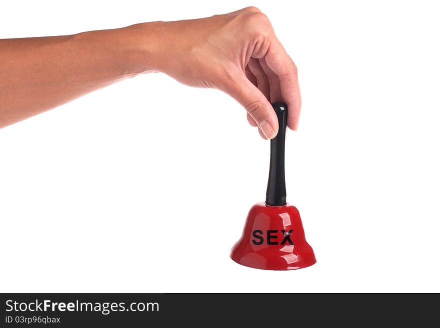 Concept. Women's hand holding red bell with sign sex. Concept. Women's hand holding red bell with sign sex.