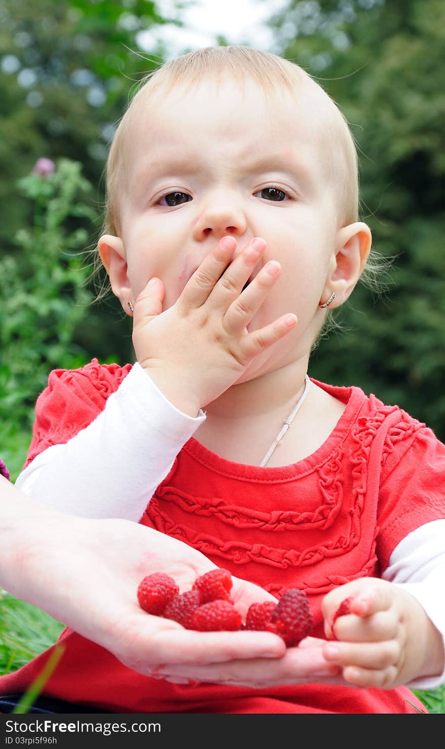 Year-old Girl Eating Raspberries