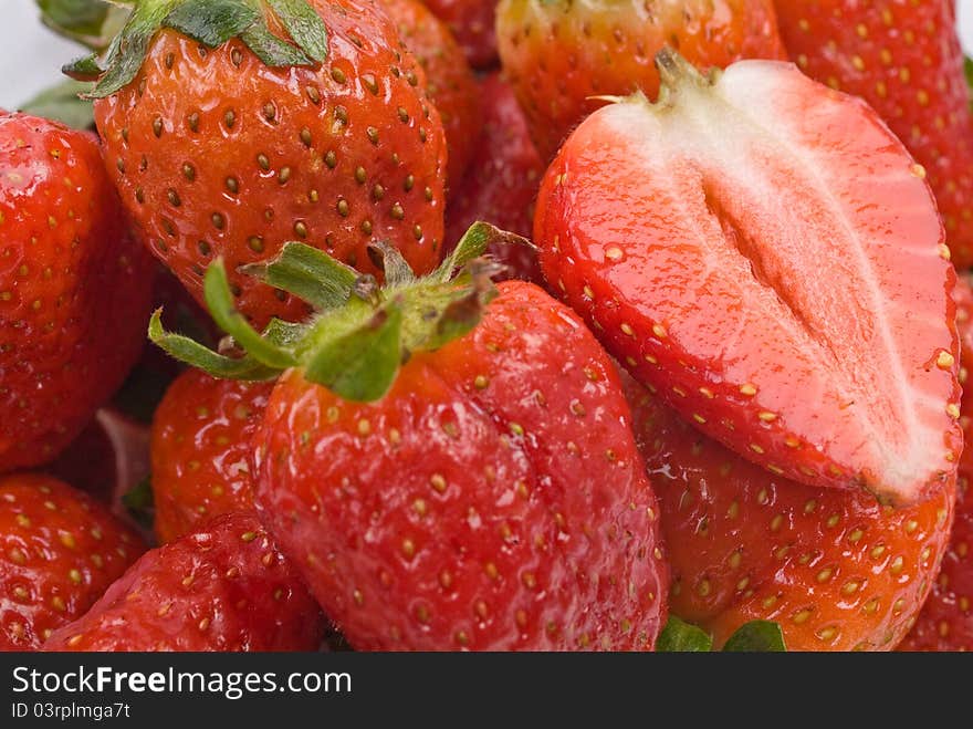 Strawberries in detail, one halved