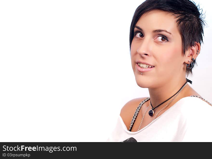 Happy brunette teenager girl with rock attitude on white background. Happy brunette teenager girl with rock attitude on white background