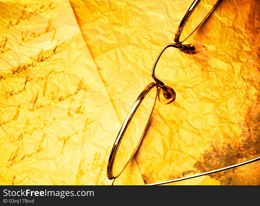 Close up of Vintage paper background with old eyeglasses. Close up of Vintage paper background with old eyeglasses