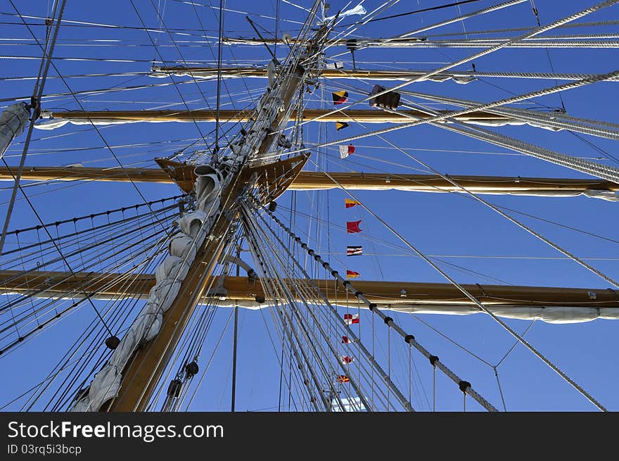 Sails ship masts with flags