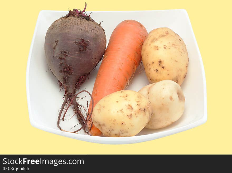 Vegetables on a plate it is isolated