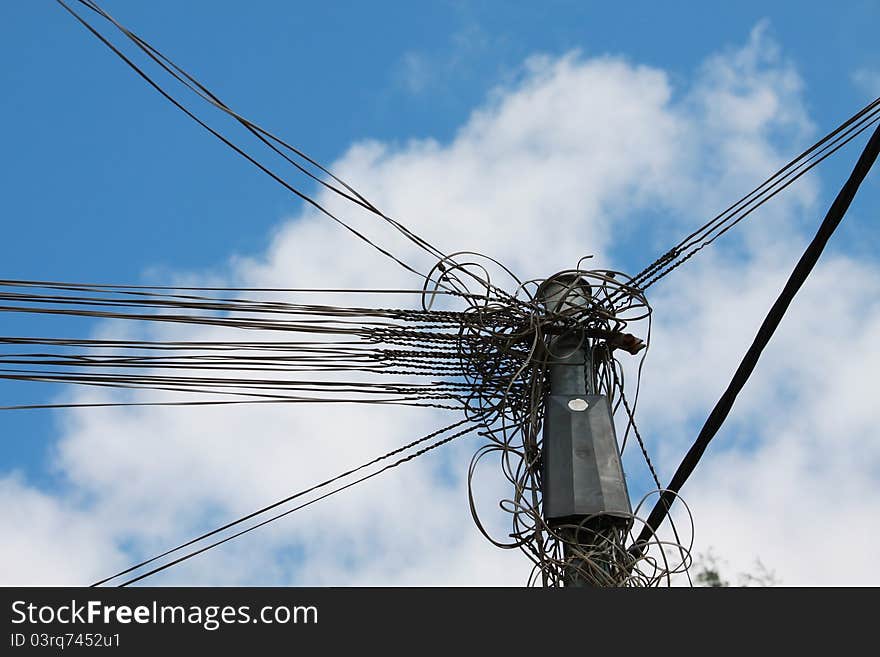 Electic wires under blue sky