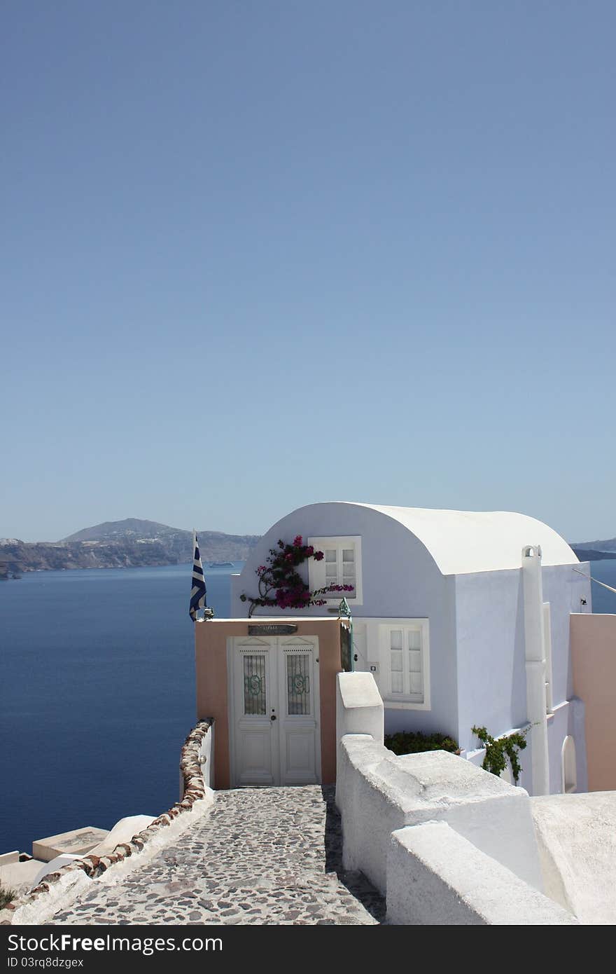 White door in Santorini, landscape panorama and sea in Oia Santorini Greece