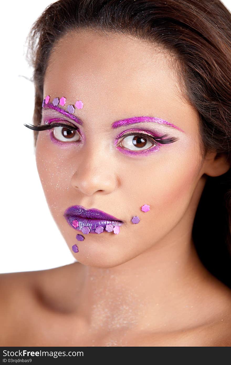 Female with purple and pink makeup