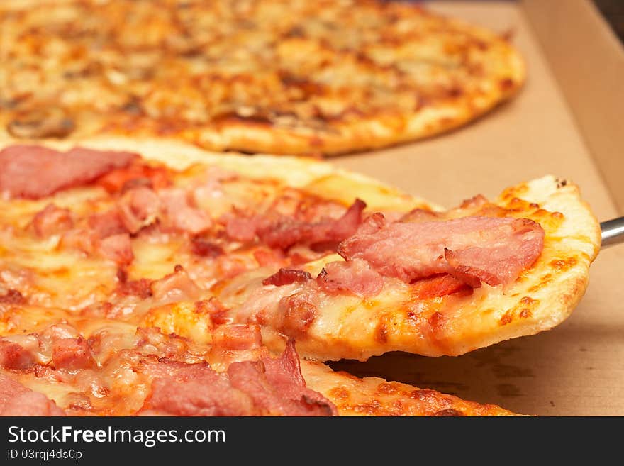 Tasty italian pizza with bacon and cheese