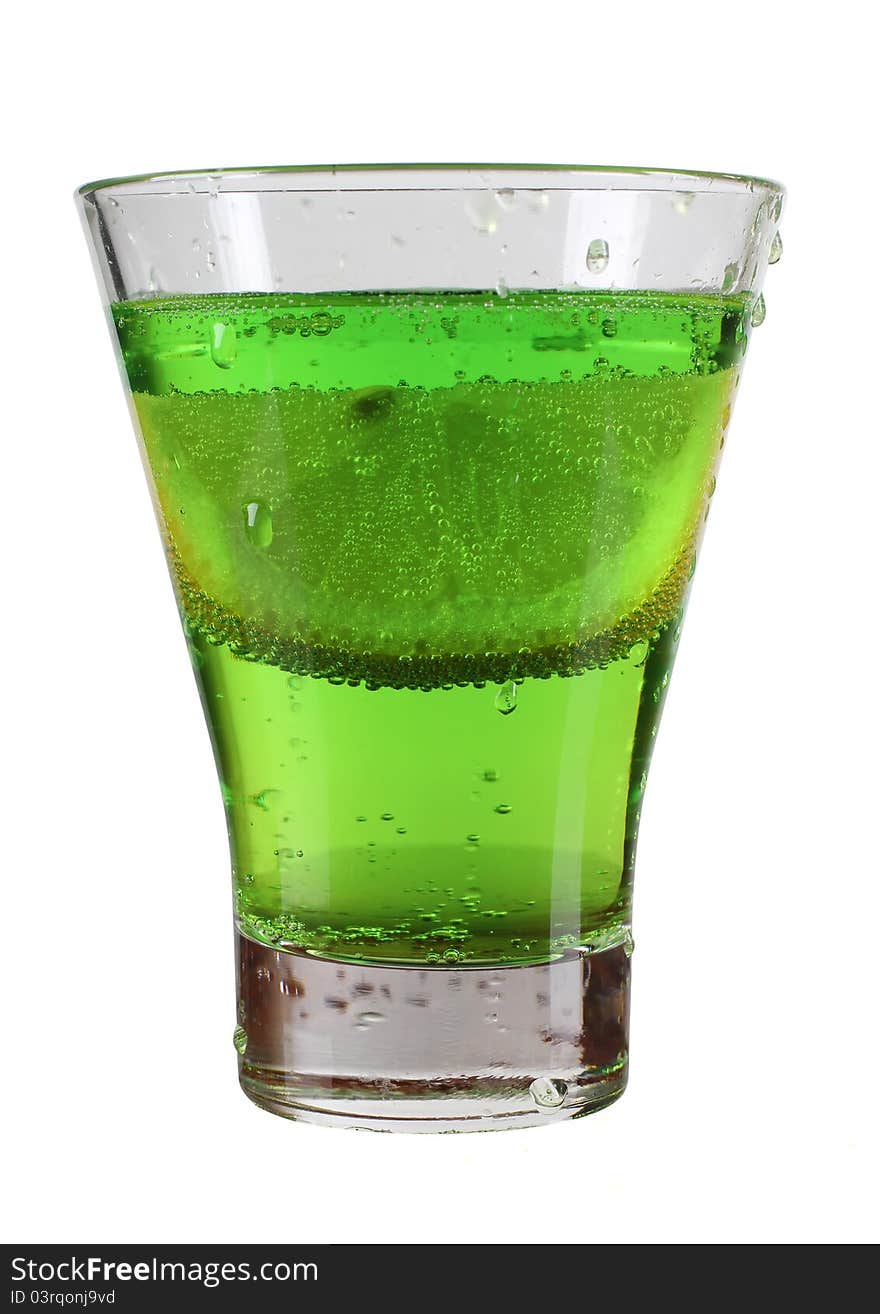 Green cocktail in cup