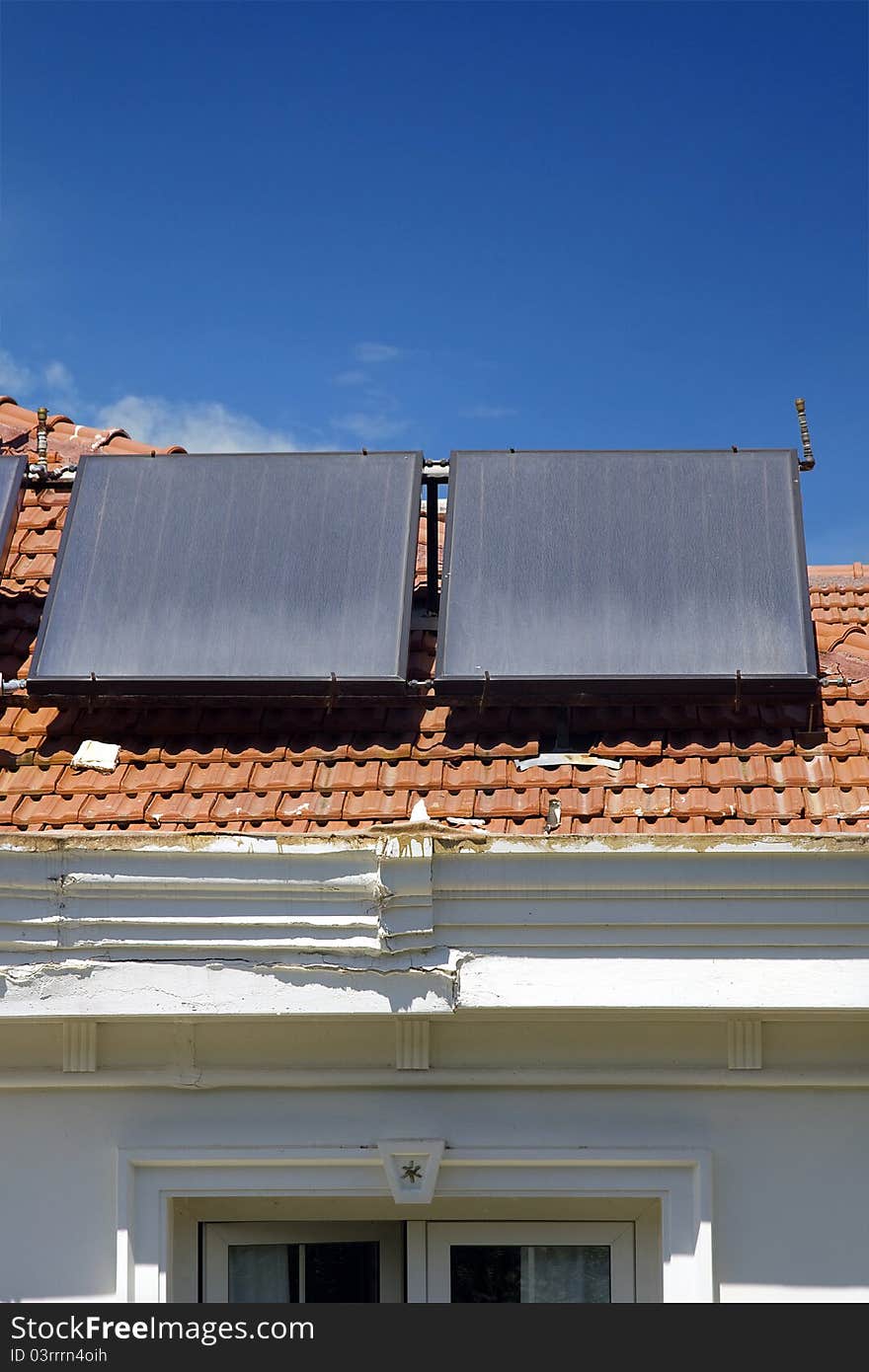 Domestic solar panels catching the sun's rays to power the home