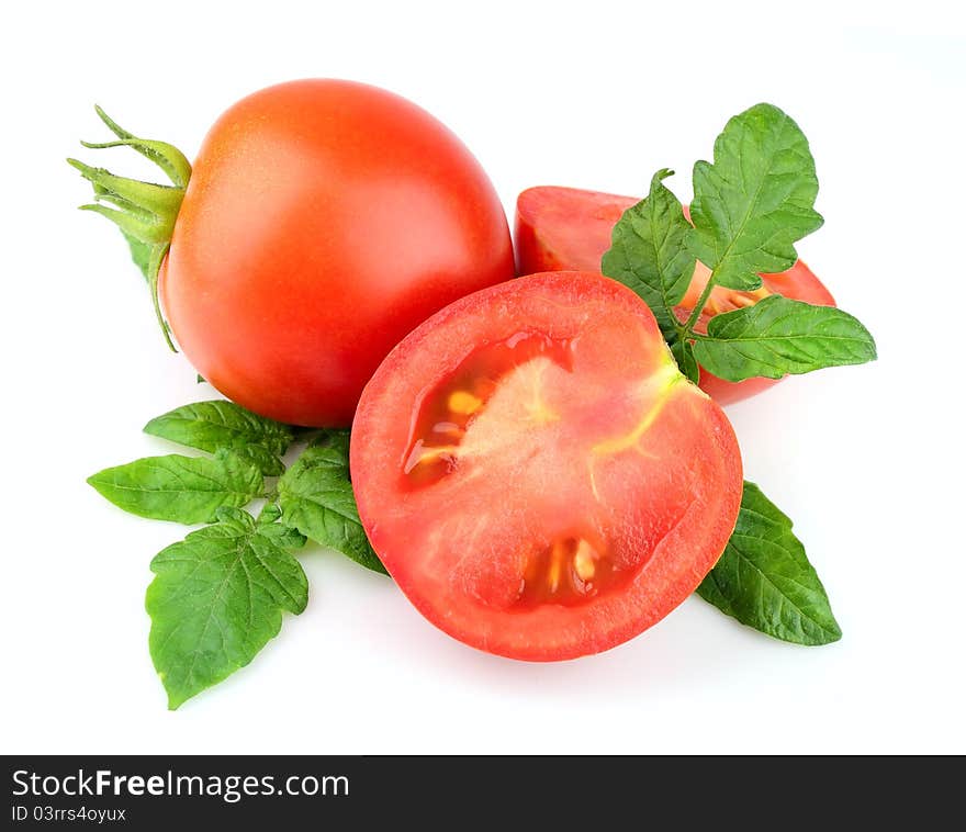 Sweet tomatoes with leafs