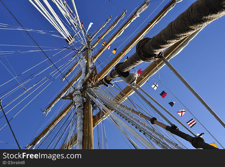 Sails ship masts with flags