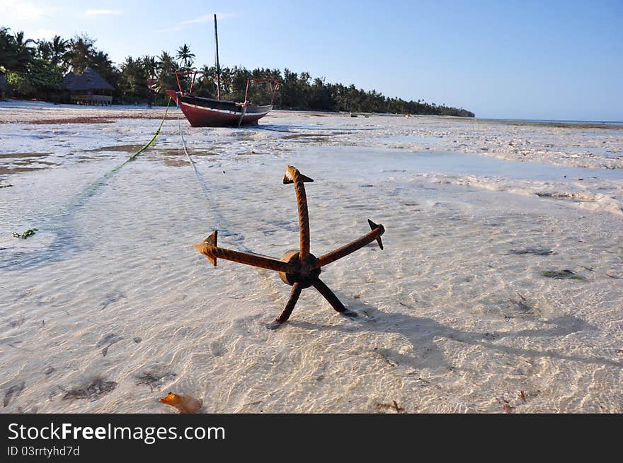 Boats on the beach of zanzibar during a low tide. Boats on the beach of zanzibar during a low tide