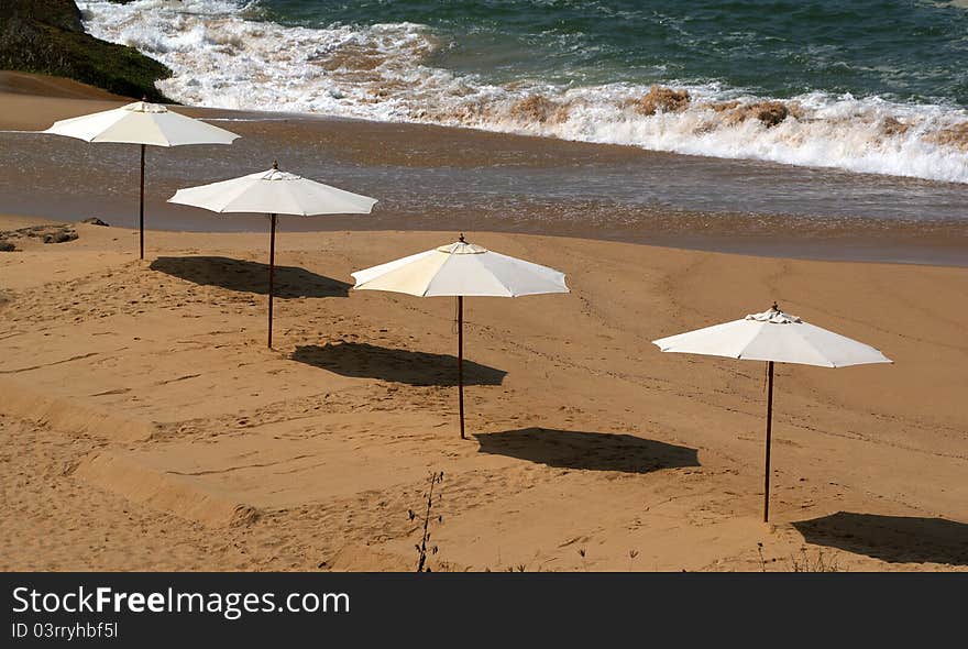 Parasol on a sandy beach