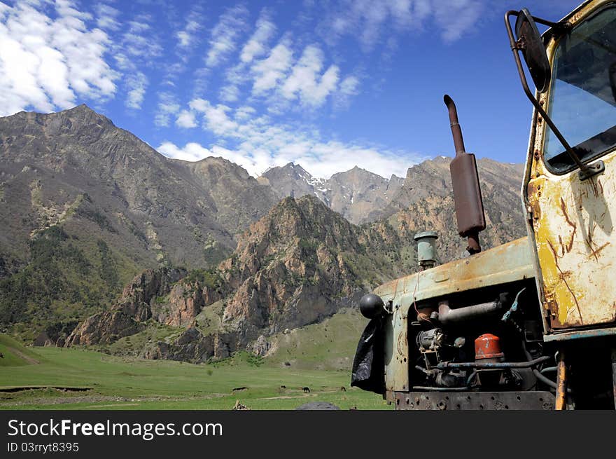 Оld tractor in mountain