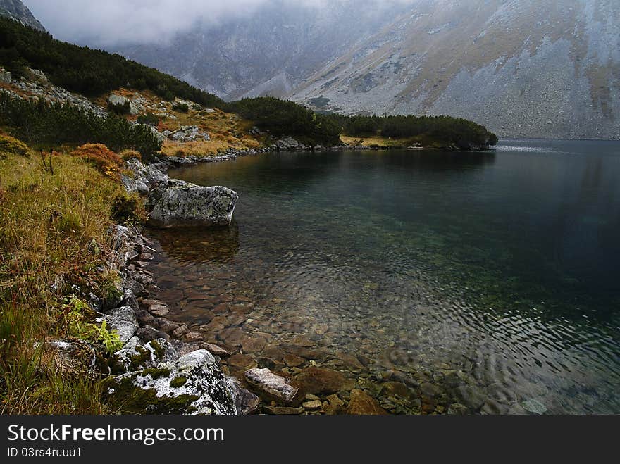 View of the lake in a dill Temnosmrečianske Valley. View of the lake in a dill Temnosmrečianske Valley