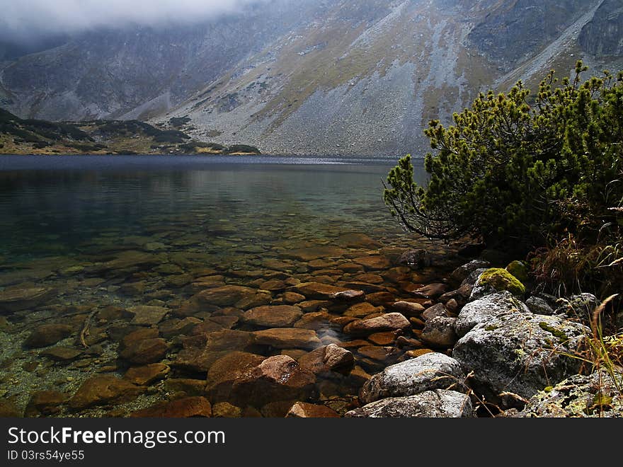 View of the lake in a dill Temnosmrečianske Valley. View of the lake in a dill Temnosmrečianske Valley