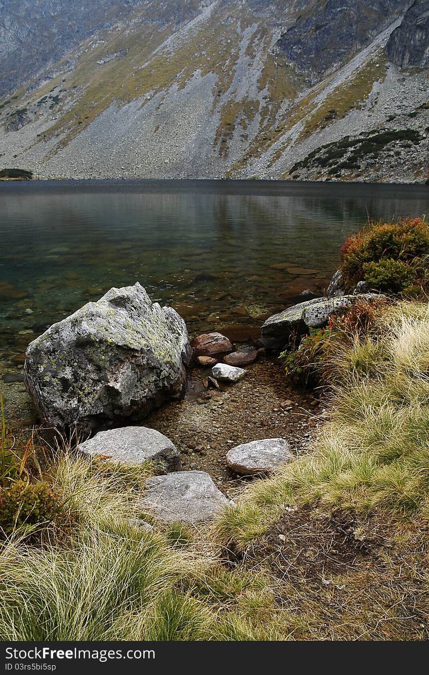 View of the lake in a dill Temnosmrečianske Valley. View of the lake in a dill Temnosmrečianske Valley