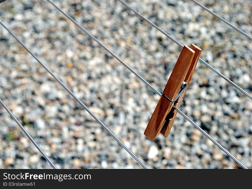 Clothes peg standing on the line