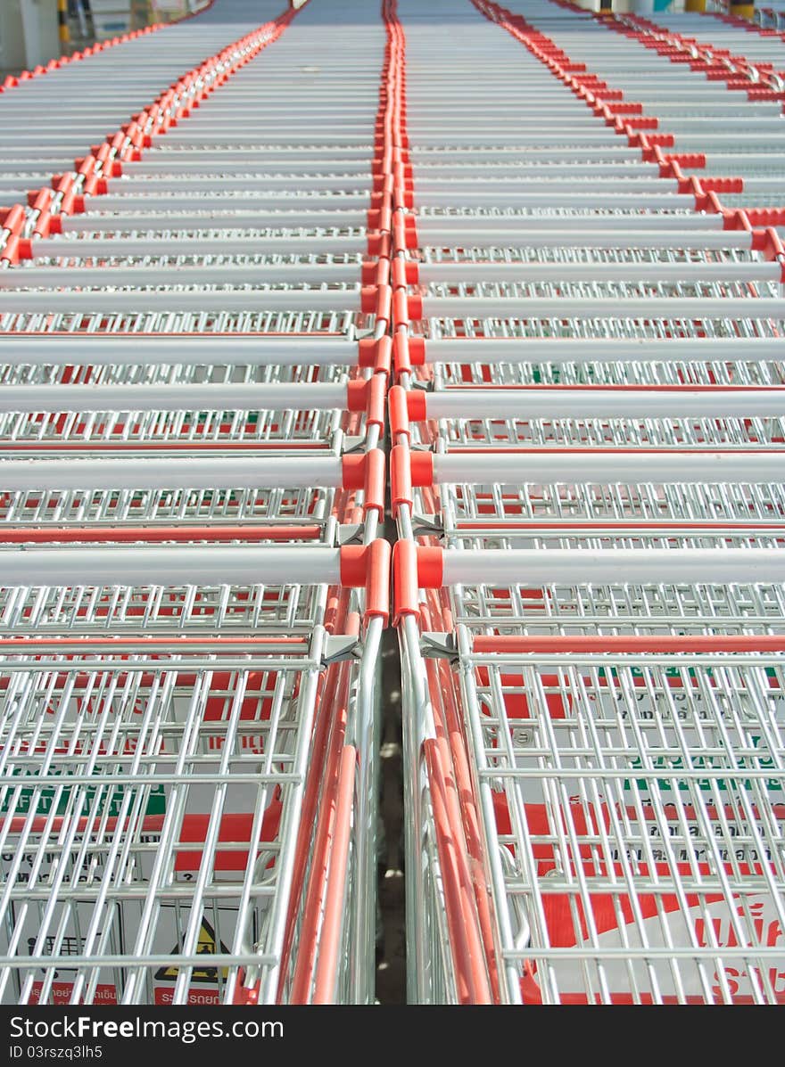 Row of shopping cart in front of supermarket