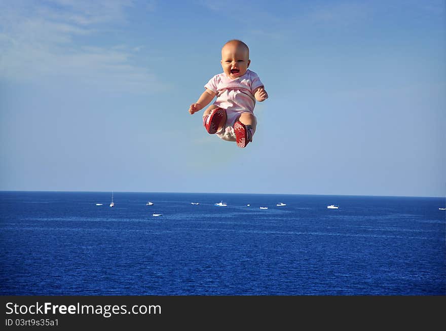 Child In Flight Over The Sea