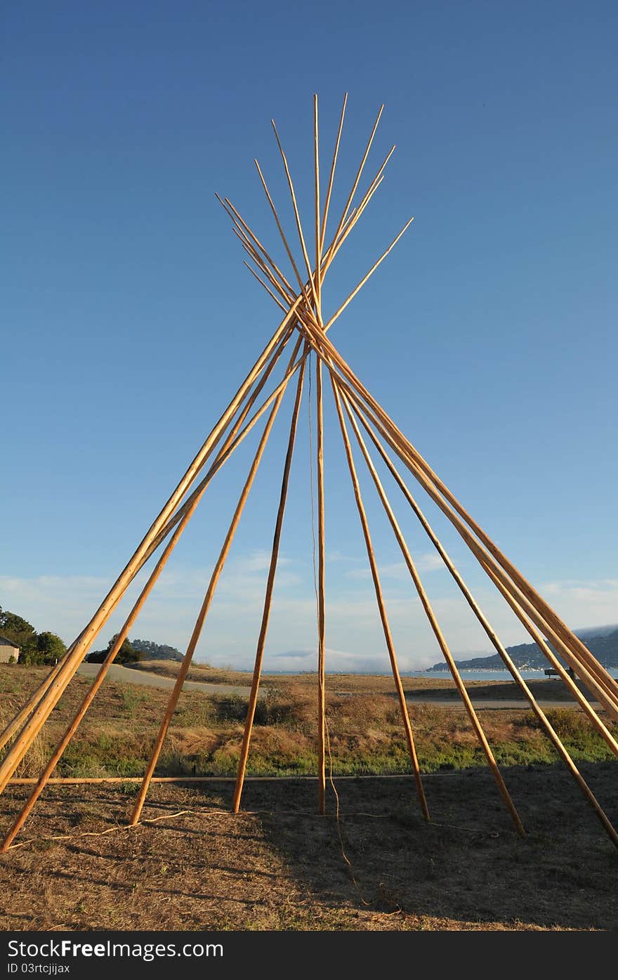 Frame of a teepee structure as it is built